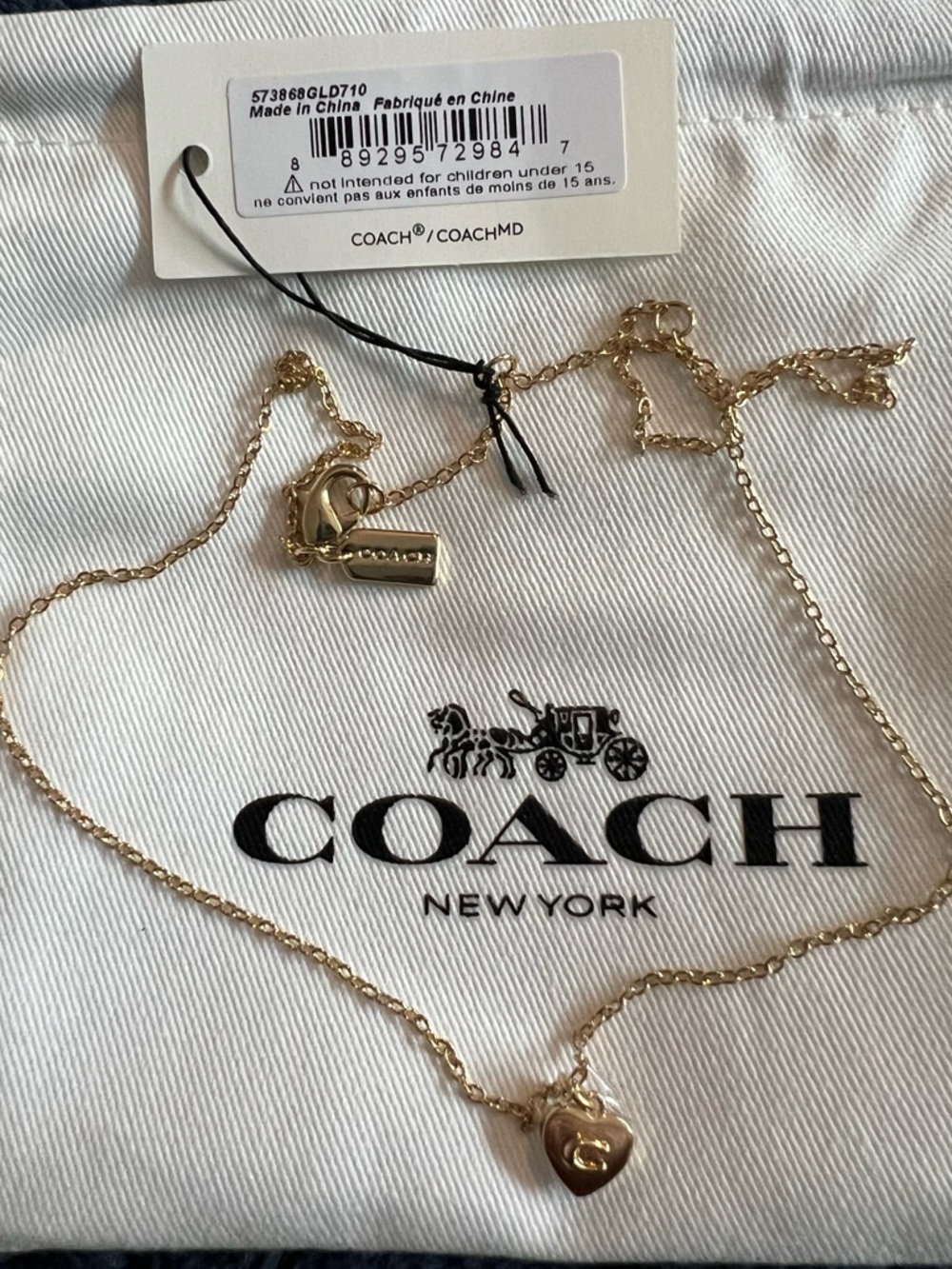 Coach Gold-Tone pendant necklace